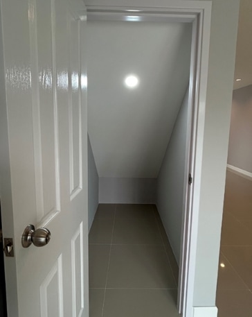 Room under the stairs.
